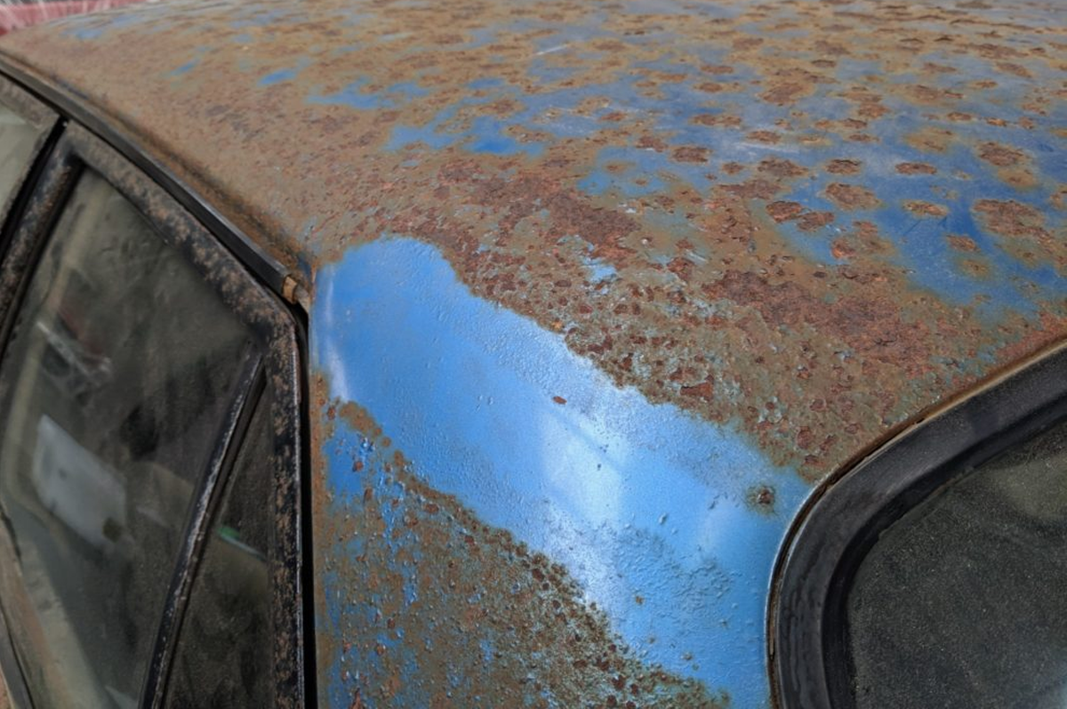 Can I use a car wrap to cover scratches, dents, rust or bad paint?